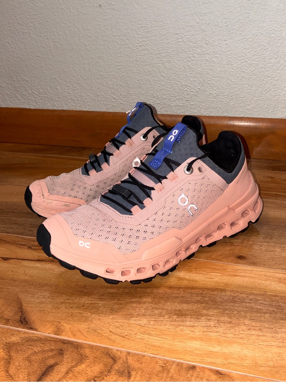 On Running Women's Pink Athletic Shoes with Black Accents